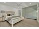 Main bedroom featuring wood-look floors, a ceiling fan, and built-in storage at 8419 Sylvan Woods Dr, Sarasota, FL 34243
