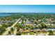 Aerial view of a home with a pool in a neighborhood near the ocean at 914 82Nd Nw St, Bradenton, FL 34209