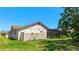 The backyard showcases a screened-in pool and fenced yard at 914 82Nd Nw St, Bradenton, FL 34209