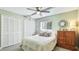 A cozy bedroom features ample storage and natural light from a large window at 914 82Nd Nw St, Bradenton, FL 34209