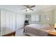 Bright bedroom with large closet, crown molding, and ceiling fan at 914 82Nd Nw St, Bradenton, FL 34209