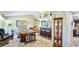 The open floor plan features tile floors, stone countertops, and a wooden dining table at 914 82Nd Nw St, Bradenton, FL 34209