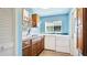 Bright laundry room features a modern sink and a front-loading washer and dryer at 914 82Nd Nw St, Bradenton, FL 34209