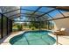 Enjoy this screened-in pool with tranquil views of the backyard at 914 82Nd Nw St, Bradenton, FL 34209