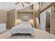 Cozy bedroom featuring vaulted ceilings, recessed lighting, and en-suite bathroom at 1233 Dockside Pl # 207, Sarasota, FL 34242