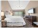 Charming bedroom featuring bright natural light, modern furniture and a ceiling fan at 1233 Dockside Pl # 207, Sarasota, FL 34242