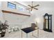 Bright living room featuring high ceilings, exposed beam, clerestory windows and staircase at 1233 Dockside Pl # 207, Sarasota, FL 34242