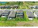 Aerial view displaying well-kept lawns and ponds surrounding the beautifully designed homes at 12664 Oak Hill Way, Parrish, FL 34219