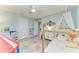 bedroom with bright decor, carpet, tent, and toys at 12664 Oak Hill Way, Parrish, FL 34219