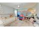 Charming bedroom with decorative wall art, tent and soft colorful carpet at 12664 Oak Hill Way, Parrish, FL 34219