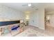 bedroom with bunk beds and fun decorative wallpaper at 12664 Oak Hill Way, Parrish, FL 34219