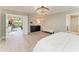 Bright and spacious main bedroom featuring hardwood floors and a connected sitting area at 12664 Oak Hill Way, Parrish, FL 34219