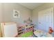 Cozy playroom with an assortment of toys, a whiteboard and a learning center for children at 12664 Oak Hill Way, Parrish, FL 34219