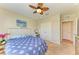 Bright bedroom with a ceiling fan, closet, and decor at 12738 Hysmith Loop, Parrish, FL 34219