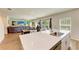 Bright kitchen features a spacious island with stainless steel sink at 12738 Hysmith Loop, Parrish, FL 34219