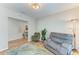 Comfortable living room with hardwood floors, comfortable seating, and natural light at 12738 Hysmith Loop, Parrish, FL 34219