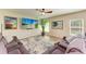 Comfortable living room featuring a large sectional sofa and modern decor at 12738 Hysmith Loop, Parrish, FL 34219