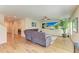 Cozy living room with a sectional sofa and open floor plan at 12738 Hysmith Loop, Parrish, FL 34219
