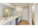 Bright bathroom with double sink vanity and modern fixtures at 12738 Hysmith Loop, Parrish, FL 34219