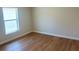 Bedroom features wood-look floors and a large window at 1428 19Th St, Sarasota, FL 34234