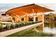 Botanical Gardens exterior featuring modern architecture, water feature, and lush landscaping at 1428 19Th St, Sarasota, FL 34234