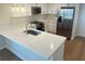 Beautiful kitchen with quartz countertops, stainless steel appliances, and stylish fixtures at 1428 19Th St, Sarasota, FL 34234