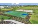 Community basketball and sand volleyball courts with well-maintained landscaping at 16226 Paynes Mill Dr, Bradenton, FL 34211