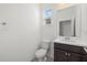 Clean half bath featuring a toilet, sink and mirror at 16226 Paynes Mill Dr, Bradenton, FL 34211