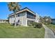 Beautiful two-story condo featuring a screened-in lanai and well-manicured landscaping at 1697 Northampton St # 1699-D, Venice, FL 34293