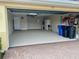Spacious two-car garage with ample room for storage and vehicles at 193 Montelluna Dr, North Venice, FL 34275