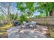 Outdoor patio area featuring a dining set and grill, perfect for entertaining at 229 42Nd W St, Bradenton, FL 34209