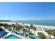 Breathtaking aerial view showcasing the beach, pool area, and crystal-clear turquoise water at 230 Sands Point Rd # 3501, Longboat Key, FL 34228