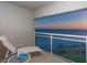Relaxing balcony featuring a lounger and stunning views of the ocean at sunset at 230 Sands Point Rd # 3501, Longboat Key, FL 34228