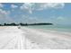 Expansive beach with white sand and turquoise water offers a tranquil escape at 230 Sands Point Rd # 3501, Longboat Key, FL 34228