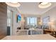 Open-concept living space with a view of the ocean, comfortable seating, and modern amenities at 230 Sands Point Rd # 3501, Longboat Key, FL 34228