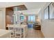 Bright living room with ocean views, a cozy seating area, and an open-concept design at 230 Sands Point Rd # 3501, Longboat Key, FL 34228