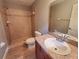 Bathroom features walk-in shower, vanity with hard surface countertop, and tiled floors at 2309 30Th W Ave, Bradenton, FL 34205