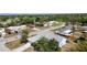 Aerial neighborhood view showing the house surrounded by greenery at 23116 Amethyst Ave, Port Charlotte, FL 33952
