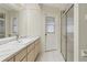 Bathroom with modern sink and walk-in shower at 23116 Amethyst Ave, Port Charlotte, FL 33952
