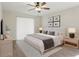 Comfortable bedroom with a plush bed, soft lighting, and soothing gray accents at 23116 Amethyst Ave, Port Charlotte, FL 33952