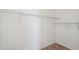 Walk-in closet featuring wire shelving for ample storage at 2332 Dovesong Trace Dr, Ruskin, FL 33570