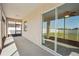 Covered patio showing sliding glass door and view of backyard at 2332 Dovesong Trace Dr, Ruskin, FL 33570