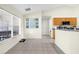 Bright eat-in kitchen features wood cabinets, and granite countertops at 2396 Malibu Ln, North Port, FL 34286