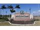 Entrance sign for Burnt Store Lakes, a deed-restricted community, showcasing a well-maintained and welcoming neighborhood at 24342 Saragossa Ln, Punta Gorda, FL 33955