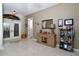 Welcoming entryway with double doors, decorative console table and neutral colors at 24342 Saragossa Ln, Punta Gorda, FL 33955