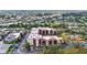 Aerial view of the condo showing amenities, including pool and walking trails, within the community at 3006 Caring Way # 210, Port Charlotte, FL 33952