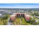 Aerial view of the building complex, close to shopping, dining, and city life at 3006 Caring Way # 210, Port Charlotte, FL 33952