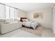 Cozy bedroom featuring a comfortable bed, soft lighting, and ample closet space at 3006 Caring Way # 210, Port Charlotte, FL 33952
