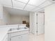 Kitchen with breakfast bar looking into living space at 3006 Caring Way # 210, Port Charlotte, FL 33952