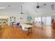 Large recreation room with tables, a TV, and access to community amenities at 3006 Caring Way # 210, Port Charlotte, FL 33952